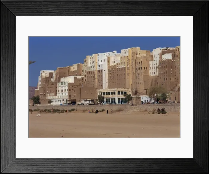 Framed Print : Backs of the tall mud brick houses on the south side