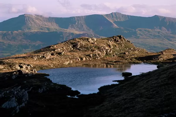 Small lake (llyn) with Cadair Idris (Cader Idris) range behind