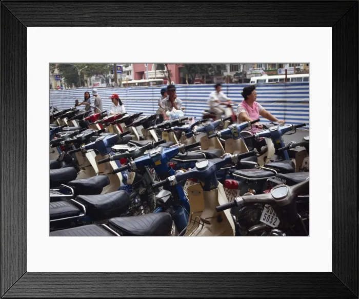 Framed Print : Rows of motorcycles parked in Ho Chi Minh City (Saigon) Framed Print : Rows of motorcycles parked in Ho Chi Minh City (Saigon)