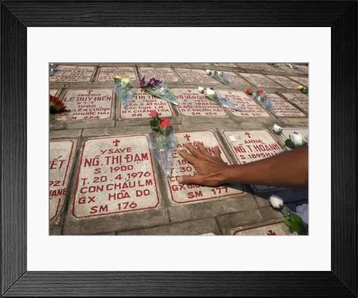 Framed Print : Graves containing cremation ashes in the wall of Nha Trang Cathedral Framed Print : Graves containing cremation ashes in the wall of Nha Trang Cathedral