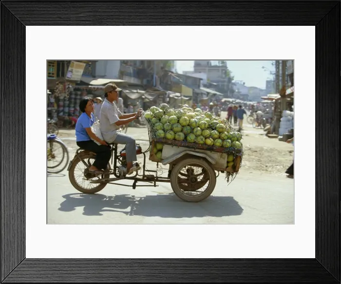 Framed Print : Melons being transported on three wheeler Xe Lam in downtown area Framed Print : Melons being transported on three wheeler Xe Lam in downtown area