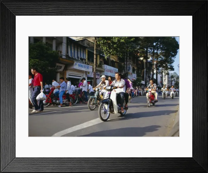 Framed Print : Motorbikes on Le Loi Boulevard in downtown area