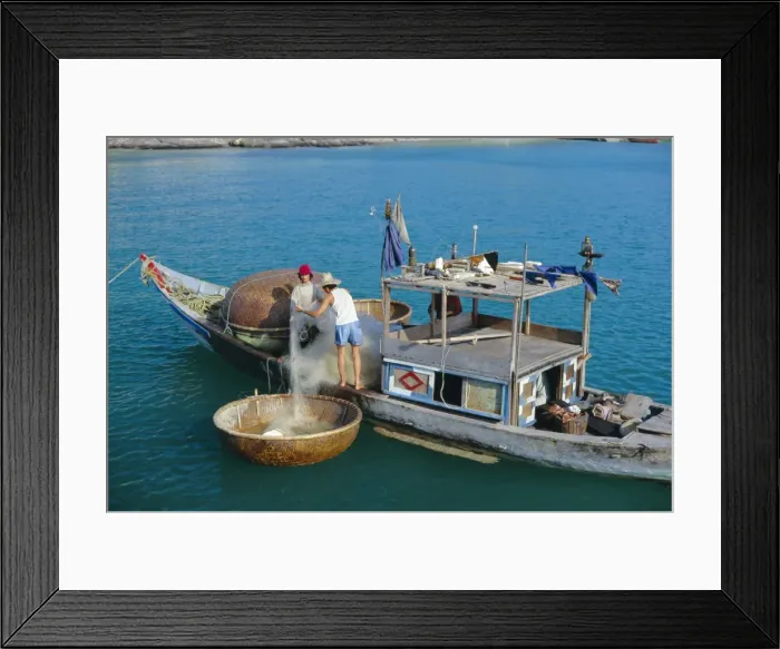 Framed Print : Fisherman sorting nets out of a traditional thung chai Framed Print : Fisherman sorting nets out of a traditional thung chai