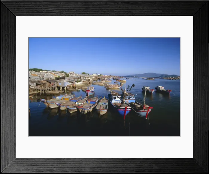 Framed Print : Colourful fishing boats in mouth of the Cai River Framed Print : Colourful fishing boats in mouth of the Cai River