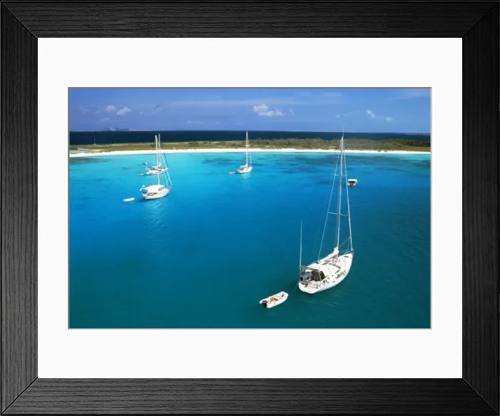 Framed Print : Chaito, sailing boat of the floating village in the foreground Framed Print : Chaito, sailing boat of the floating village in the foreground