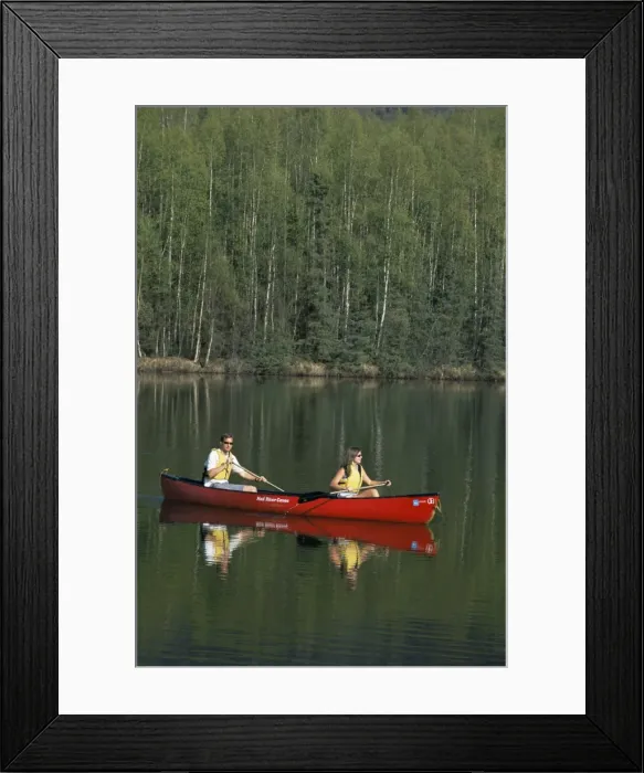 Framed Print : Man and woman canoeing in Mirror Lake Framed Print : Man and woman canoeing in Mirror Lake