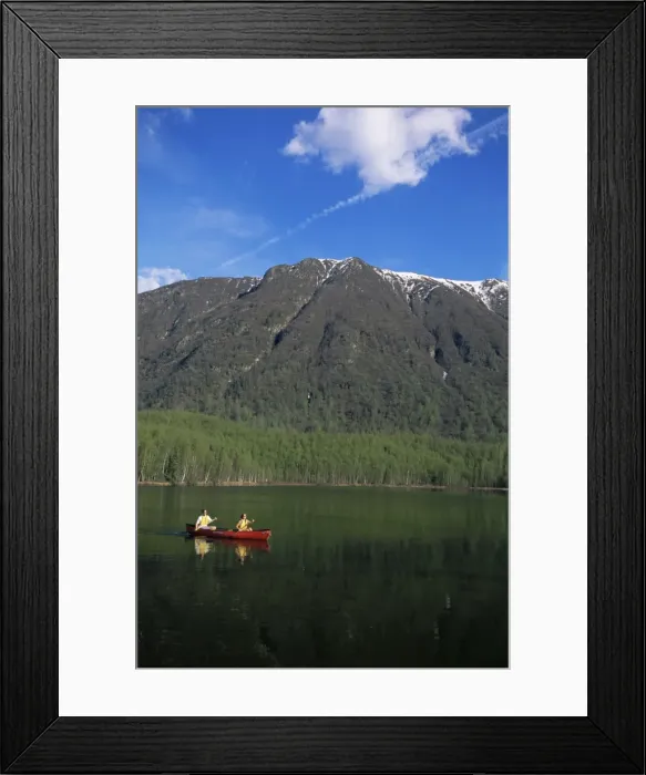 Framed Print : Man and woman canoeing in Mirror Lake Framed Print : Man and woman canoeing in Mirror Lake