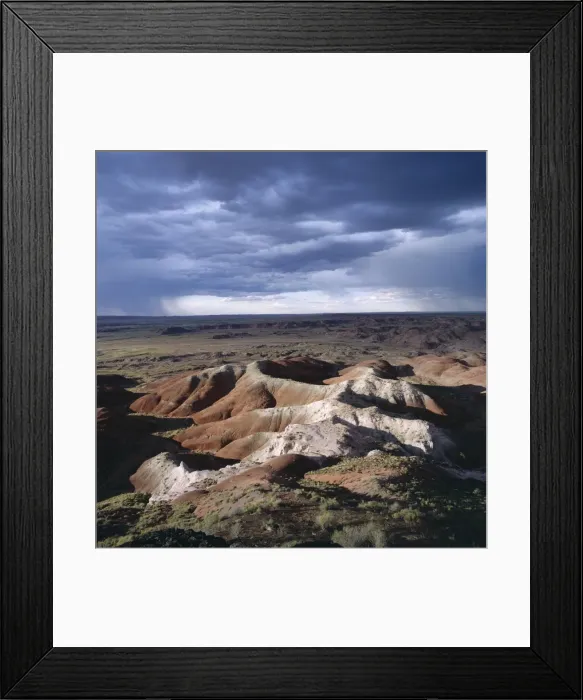 Framed Print : Eroded rocks under an overcast stormy sky Framed Print : Eroded rocks under an overcast stormy sky