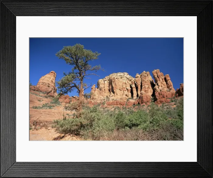 Framed Print : Towering red sandstone cliffs viewed from the Broken Arrow Trail Framed Print : Towering red sandstone cliffs viewed from the Broken Arrow Trail