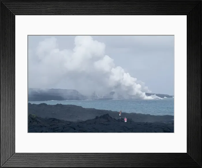 Framed Print : Steam plumes from hot lava flowing onto the beach Framed Print : Steam plumes from hot lava flowing onto the beach