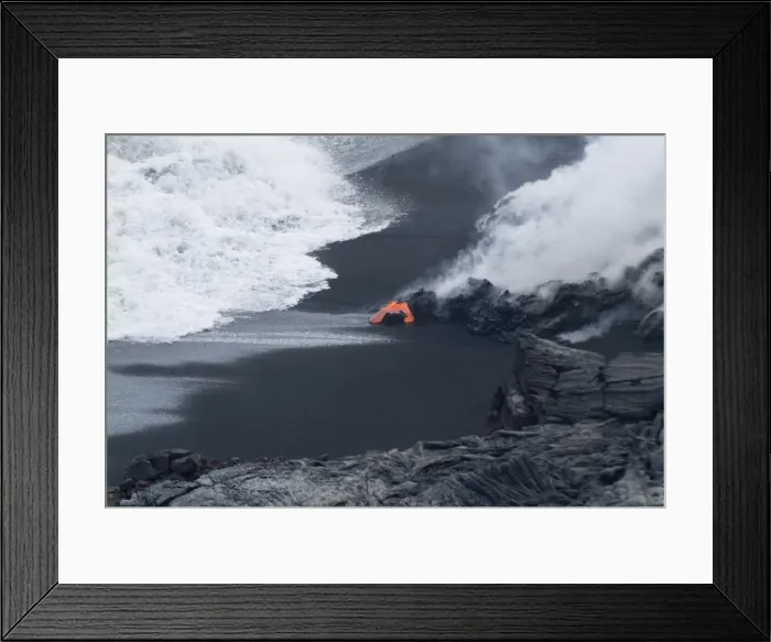 Framed Print : Hot lava flowing onto beach and into the ocean Framed Print : Hot lava flowing onto beach and into the ocean