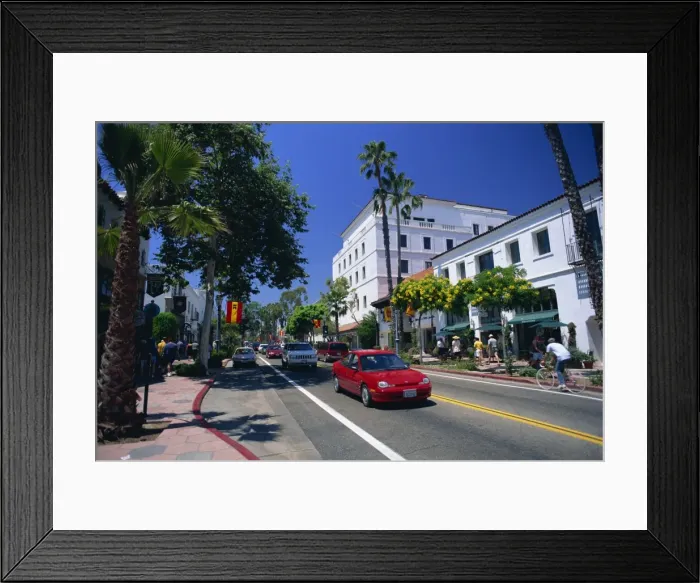 Framed Print : Red car and flowering trees on State Street in Santa Barbara Framed Print : Red car and flowering trees on State Street in Santa Barbara
