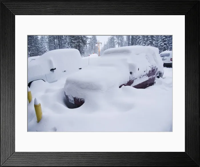 Framed Print : Cars under heavy snow fall at the winter ski resort Framed Print : Cars under heavy snow fall at the winter ski resort