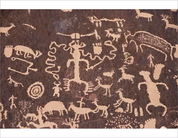 Indian petroglyphs drawn on red standstone by scratching