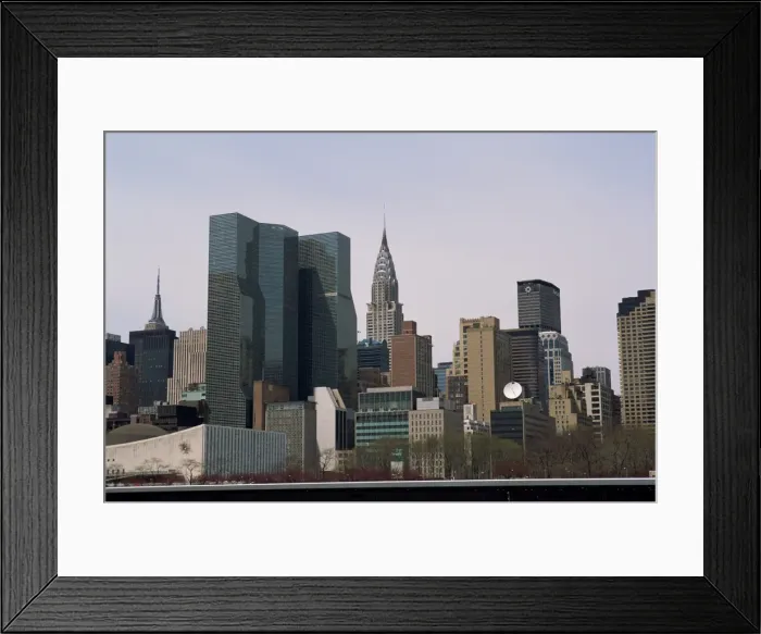 Framed Print : The city skyline including the Chrysler Building from East River Framed Print : The city skyline including the Chrysler Building from East River