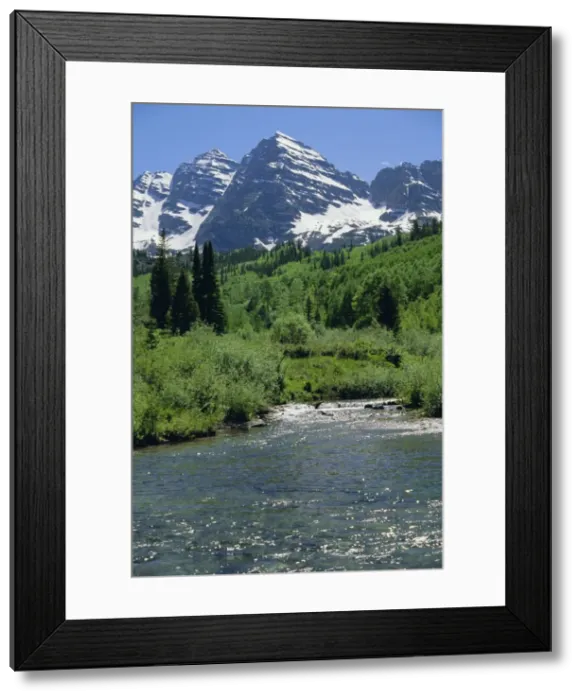 Framed Print : Maroon Bells seen from stream rushing to feed Maroon Lake nearby Framed Print : Maroon Bells seen from stream rushing to feed Maroon Lake nearby