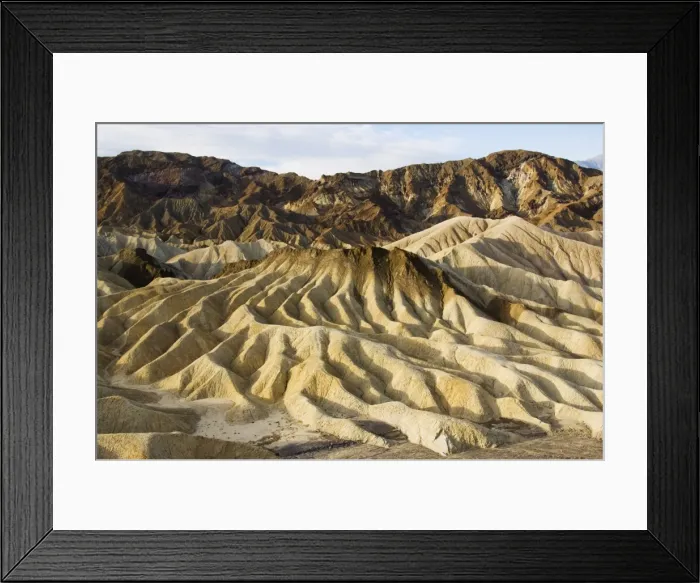 Framed Print : Early morning light on corrugated badlands landscape Framed Print : Early morning light on corrugated badlands landscape