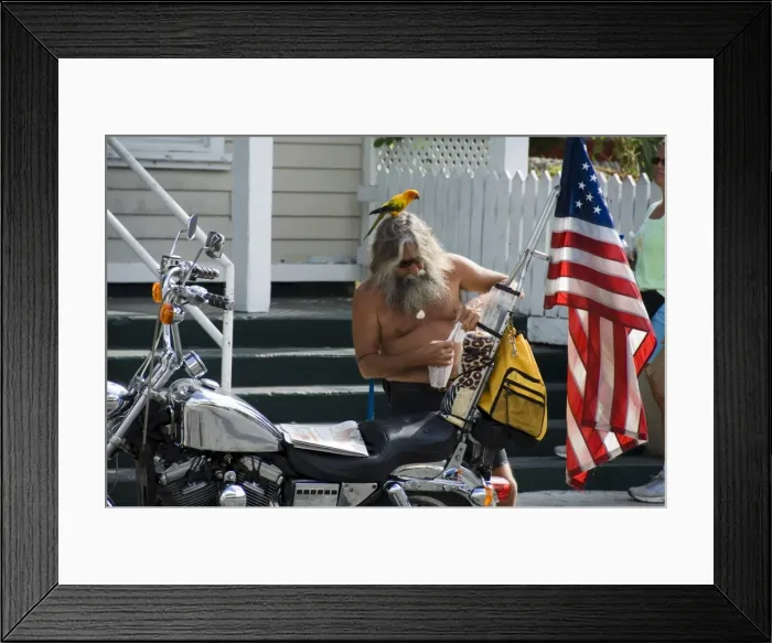 Framed Print : Motorcyclist with bird on head Framed Print : Motorcyclist with bird on head