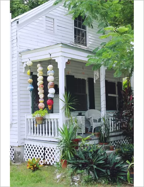 Fishing floats hanging in porch of old house in Key West