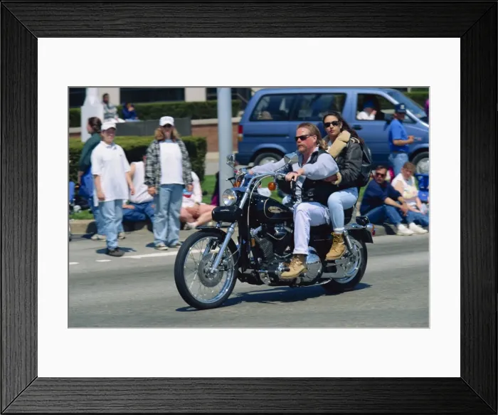 Framed Print : Couple on a Harley Davidson motorbike in Newport Framed Print : Couple on a Harley Davidson motorbike in Newport