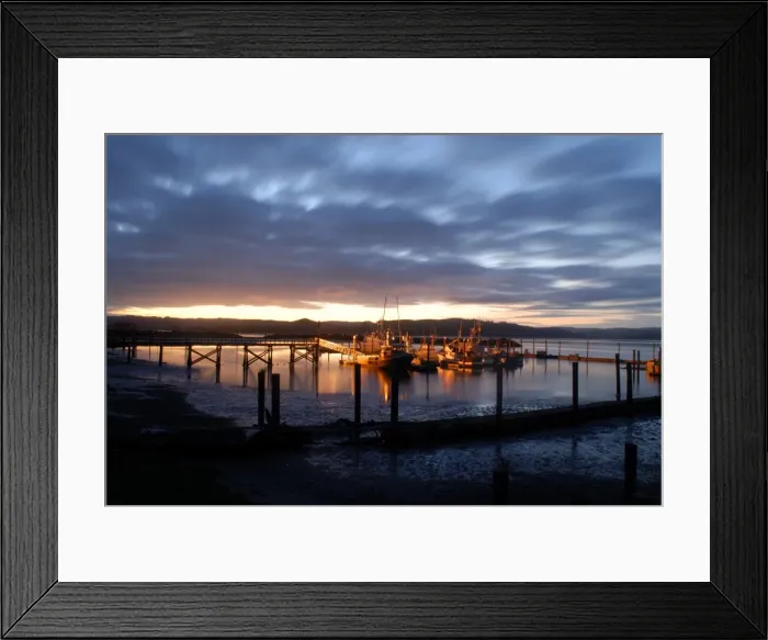 Framed Print : Fishing and crabbing boats at low tide after sunset