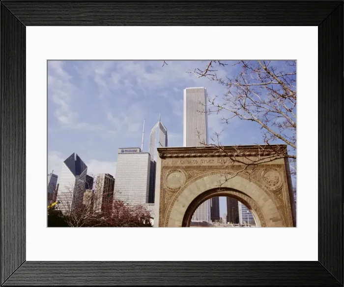 Framed Print : Old Stock Exchange arch and downtown skyscrapers Framed Print : Old Stock Exchange arch and downtown skyscrapers