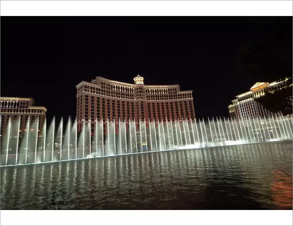 The Bellagio Hotel at night with its famous fountains