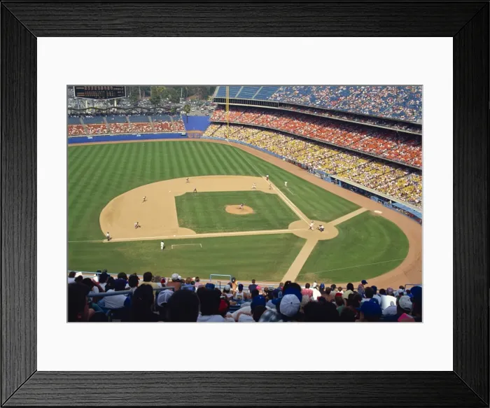 Framed Print : Crowds watch baseball game at the Dodgers Stadium in Los Angeles Framed Print : Crowds watch baseball game at the Dodgers Stadium in Los Angeles