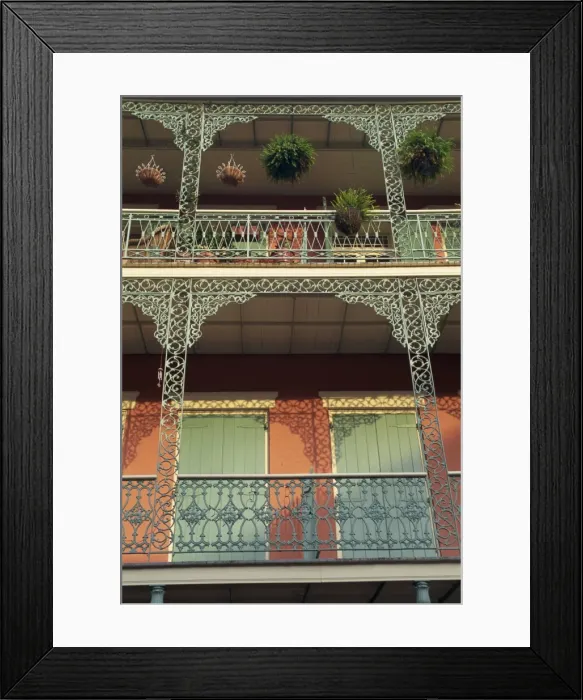 Framed Print : Detail of wrought iron and wooden shutters on balconies Framed Print : Detail of wrought iron and wooden shutters on balconies