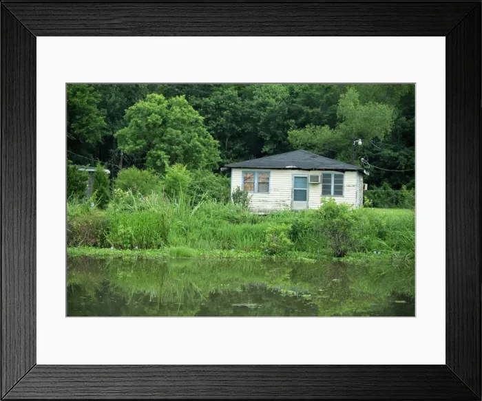 Framed Print : Simple wooden house by a bayou near Houma