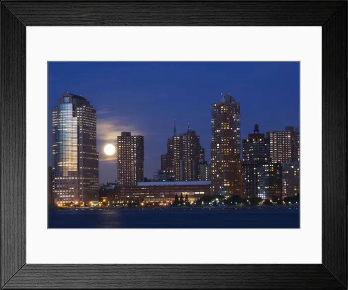 Framed Print : Full moon rising over Lower Manhattan skyline across the Hudson River Framed Print : Full moon rising over Lower Manhattan skyline across the Hudson River
