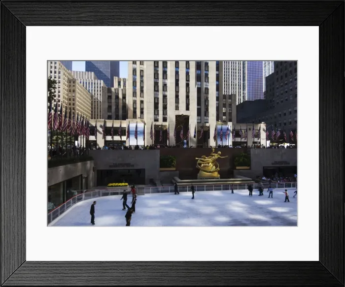 Framed Print : The Rockefeller Center with famous ice rink in the Plaza Framed Print : The Rockefeller Center with famous ice rink in the Plaza