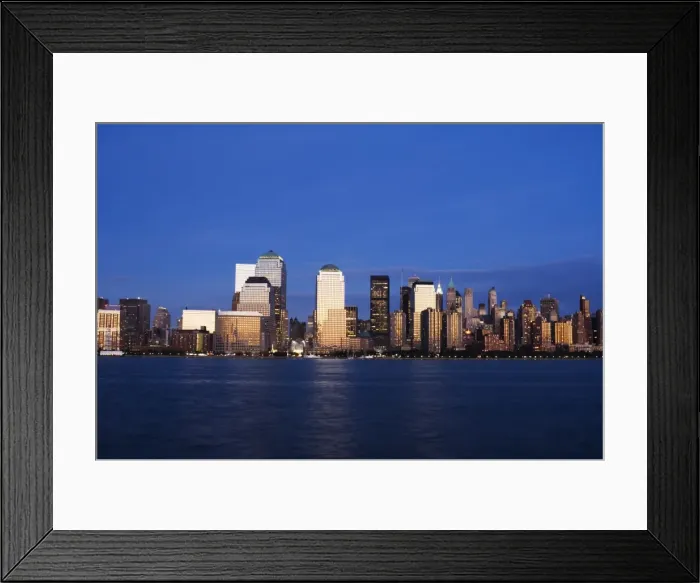 Framed Print : Lower Manhattan skyline at dusk across the Hudson River Framed Print : Lower Manhattan skyline at dusk across the Hudson River