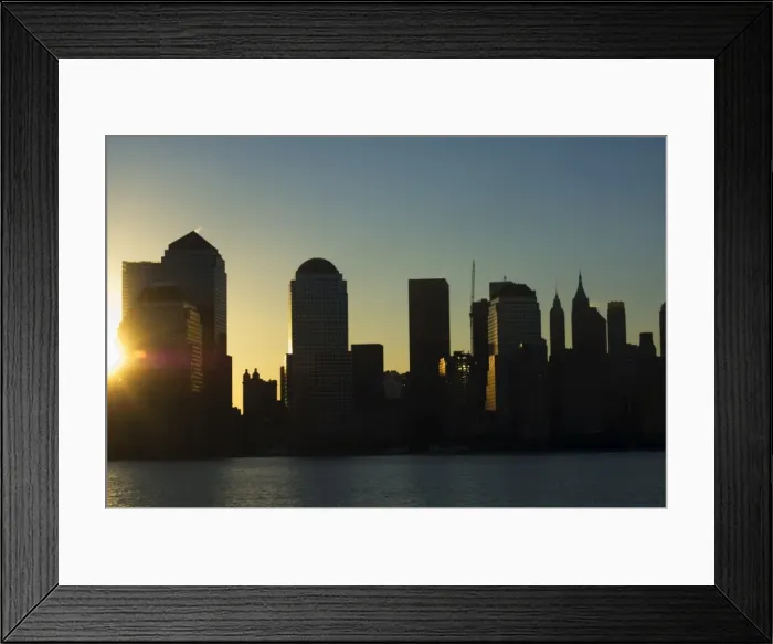 Framed Print : Lower Manhattan skyline at sunrise across the Hudson River Framed Print : Lower Manhattan skyline at sunrise across the Hudson River