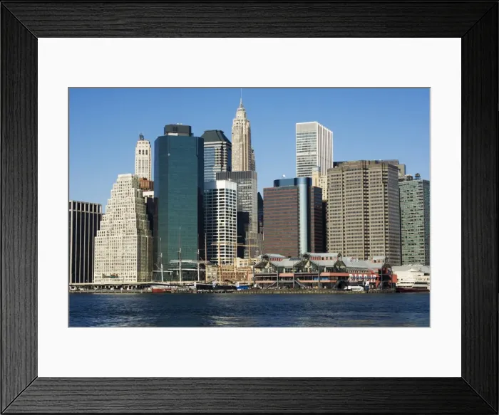 Framed Print : South Street Seaport and tall buildings beyond Framed Print : South Street Seaport and tall buildings beyond
