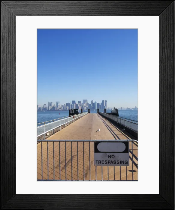 Framed Print : No trespassing sign on jetty facing Manhattan skyline Framed Print : No trespassing sign on jetty facing Manhattan skyline