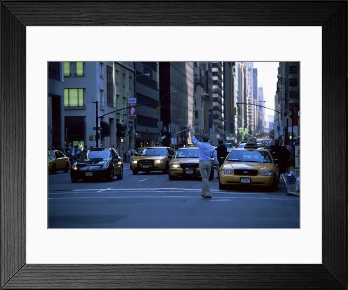 Framed Print : Main hailing taxi in downtown Manhattan Framed Print : Main hailing taxi in downtown Manhattan