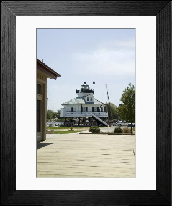 Framed Print : Typical historic lighthouse rescued and brought to Framed Print : Typical historic lighthouse rescued and brought to