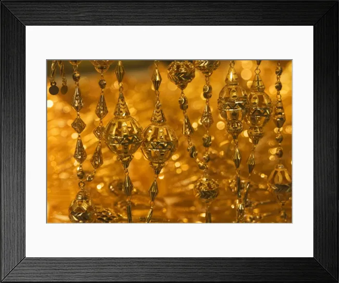 Framed Print : Close up of gold necklace on display Framed Print : Close up of gold necklace on display
