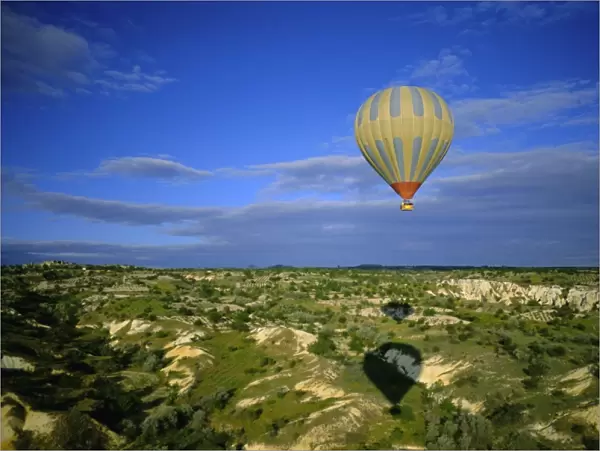 Hot air ballooning above Cappadocian landscape