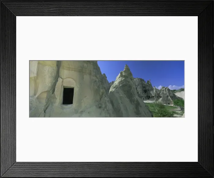 Framed Print : Ancient cave dwellings in the tufa formations at Goreme Framed Print : Ancient cave dwellings in the tufa formations at Goreme