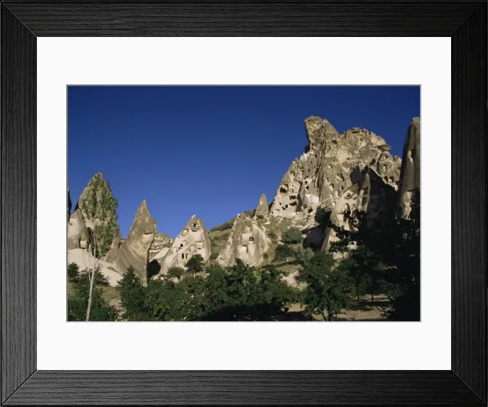 Framed Print : Apricot trees and pigeon cotes in volcanic rock Framed Print : Apricot trees and pigeon cotes in volcanic rock
