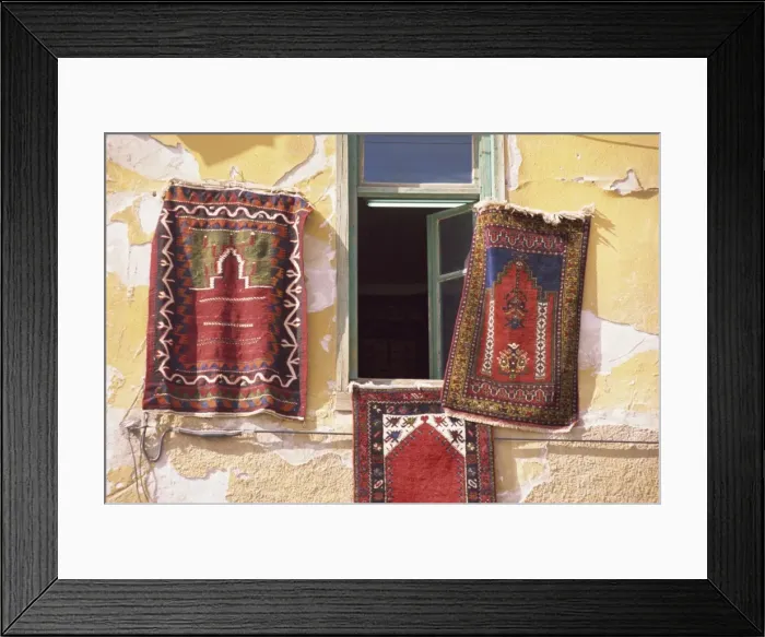 Framed Print : Carpets hanging on a wall for sale in Beysehir Framed Print : Carpets hanging on a wall for sale in Beysehir