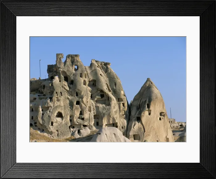 Framed Print : Houses in rock formations