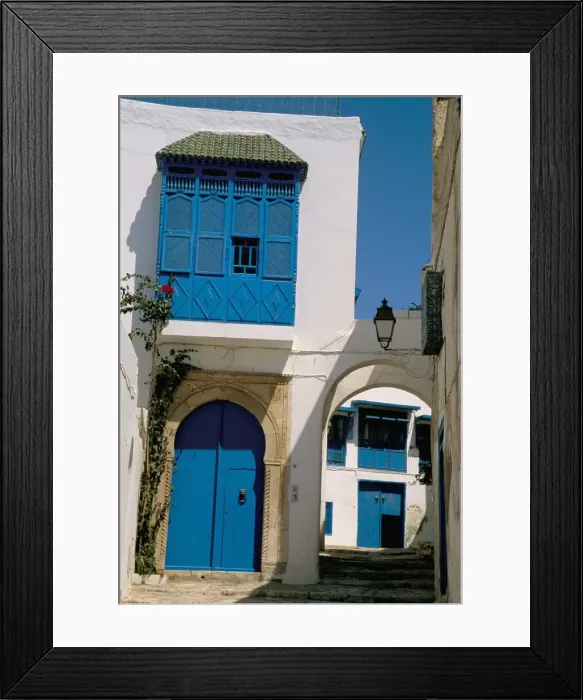 Framed Print : House painted in blue and white Framed Print : House painted in blue and white