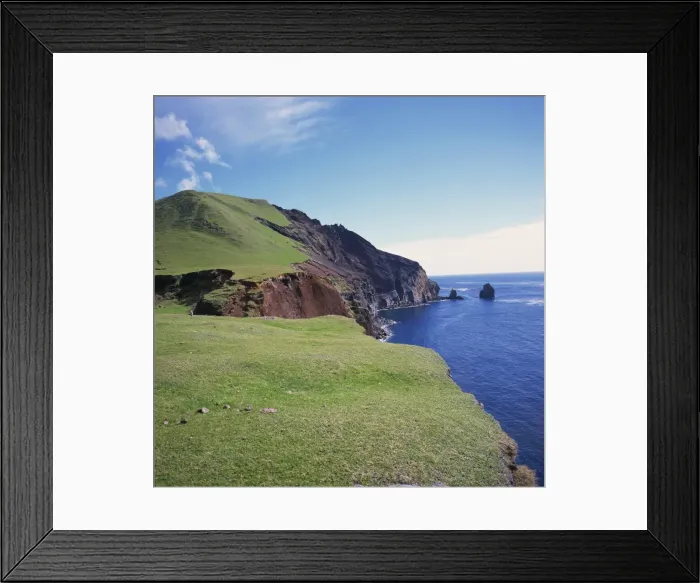 Framed Print : Grass topped cliffs along the north west coast between Framed Print : Grass topped cliffs along the north west coast between