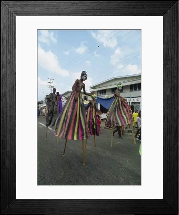 Framed Print : Men and women on stilts Framed Print : Men and women on stilts