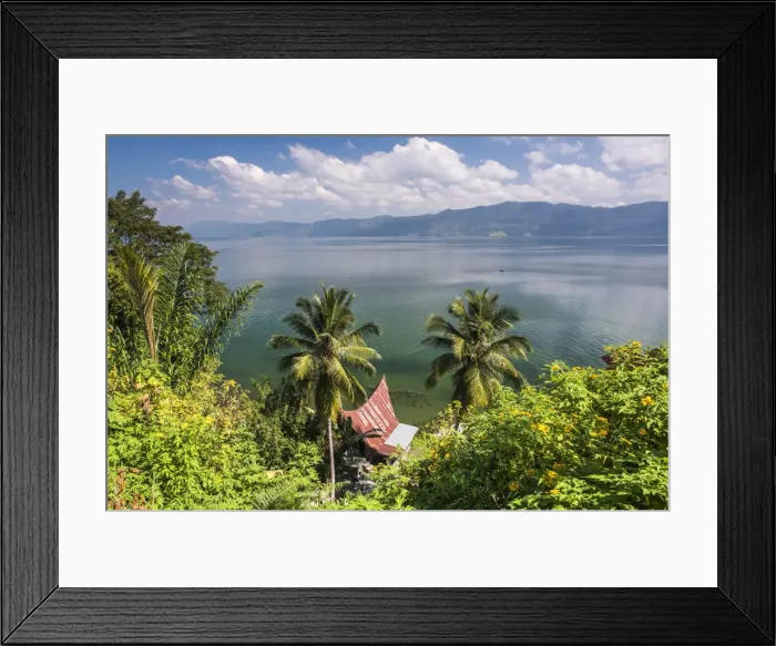 Framed Print : Batak Houses at Lake Toba (Danau Toba), the largest volcanic lake in the world, North Sumatra Framed Print : Batak Houses at Lake Toba (Danau Toba), the largest volcanic lake in the world, North Sumatra
