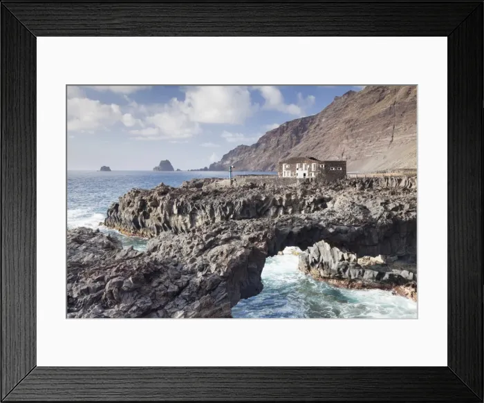 Framed Print : Rock arch and Hotel Punta Grande, Las Puntas, El Golfo, lava coast, UNESCO biosphere reserve Framed Print : Rock arch and Hotel Punta Grande, Las Puntas, El Golfo, lava coast, UNESCO biosphere reserve