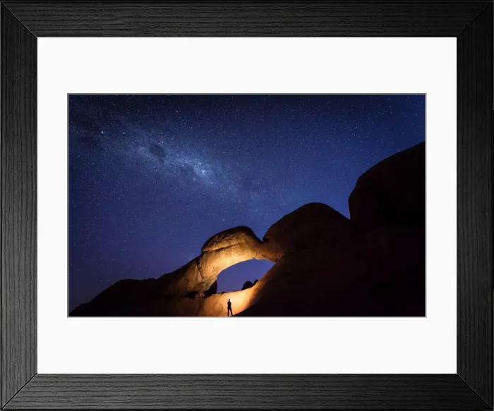 Framed Print : Tourist under the Rock Arch bridge in the Spitzkoppe region with a view of the Milky Way Framed Print : Tourist under the Rock Arch bridge in the Spitzkoppe region with a view of the Milky Way